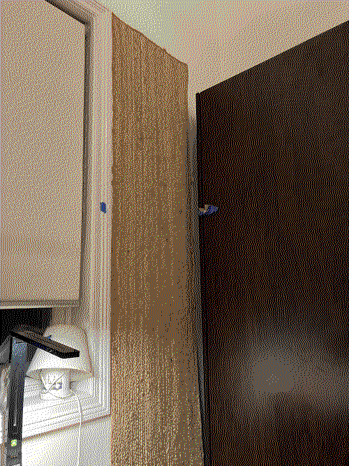 a jute rug mounted onto the wall.