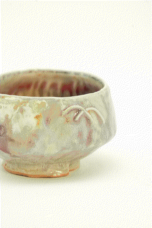 close up view of a ceramic pinched cup