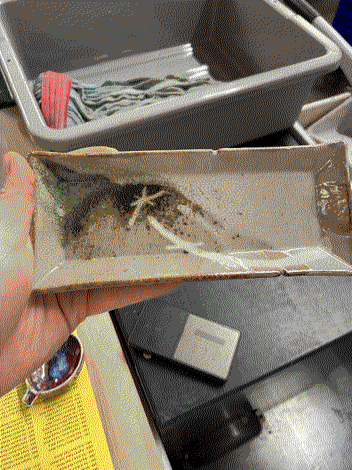 small rectangular tray with white and glossy black glaze